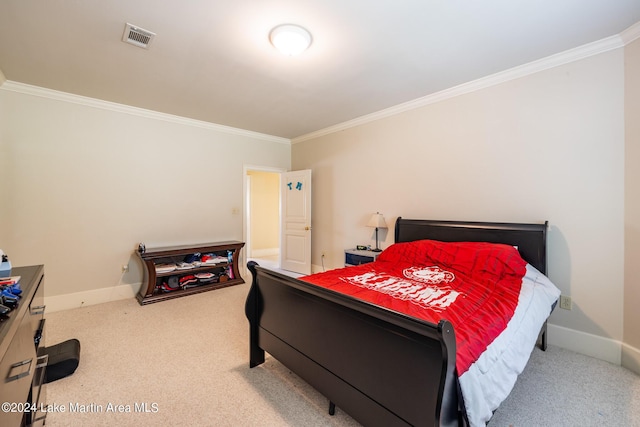 bedroom with carpet and ornamental molding