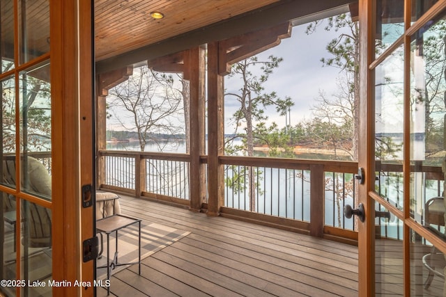 deck featuring a water view