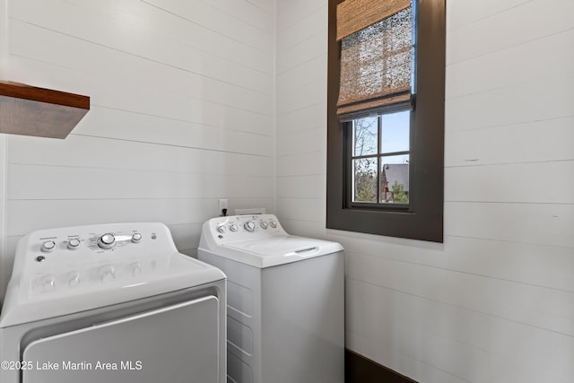 washroom with washing machine and dryer