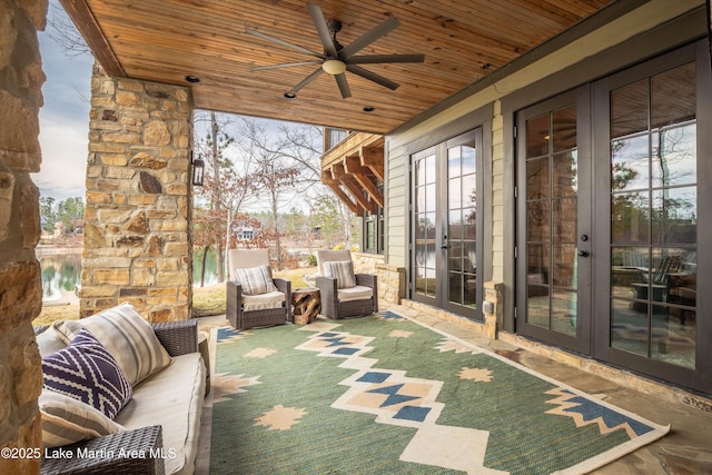 view of patio featuring an outdoor hangout area, french doors, and ceiling fan