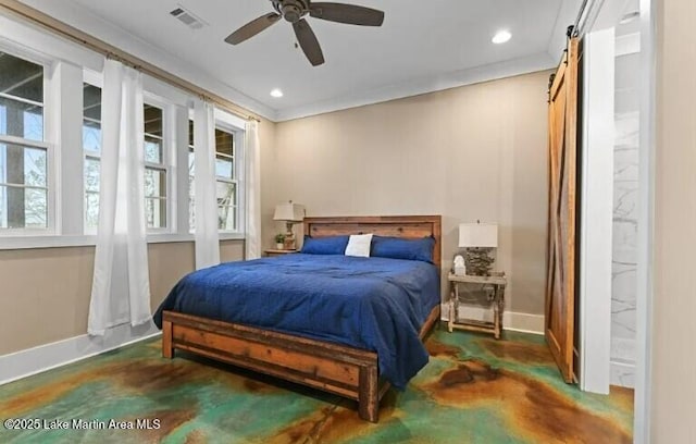 bedroom with ornamental molding, a barn door, and ceiling fan