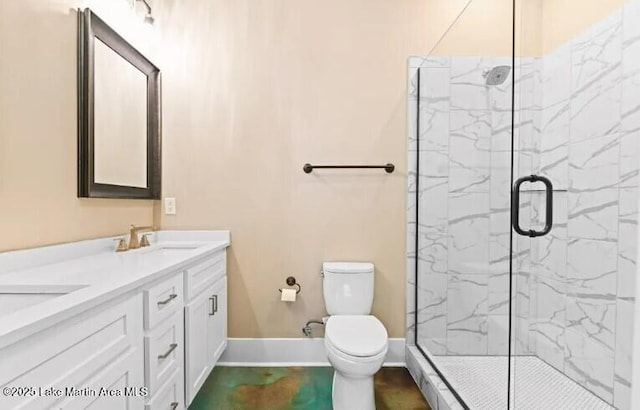 bathroom featuring vanity, toilet, and a shower with door