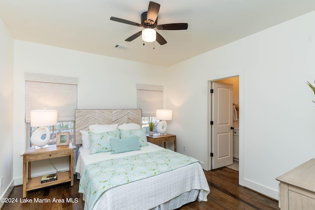 bedroom featuring dark hardwood / wood-style floors and ceiling fan