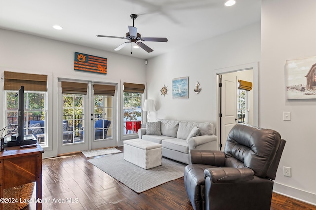 living room featuring french doors, dark hardwood / wood-style flooring, and ceiling fan