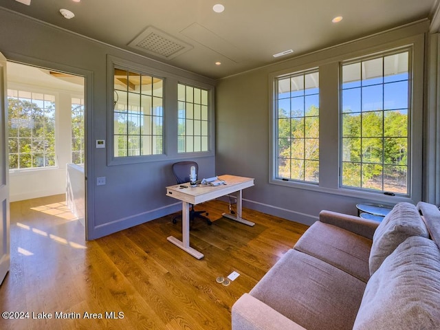 office with hardwood / wood-style flooring