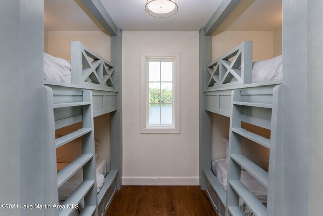 bedroom featuring dark wood-type flooring