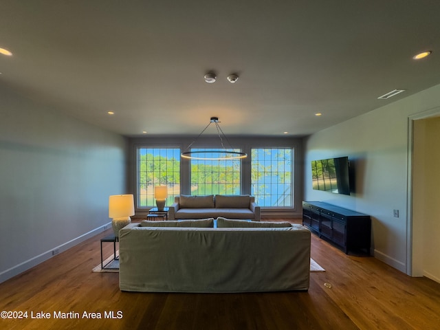 living room featuring hardwood / wood-style flooring and a wealth of natural light