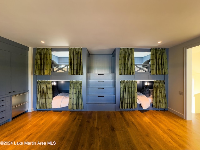 unfurnished bedroom featuring wood-type flooring