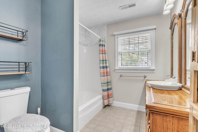 207 Mcdonald St, Dadeville, AL 36853 - bathroom with tile patterned flooring, vanity, and shower / tub combo