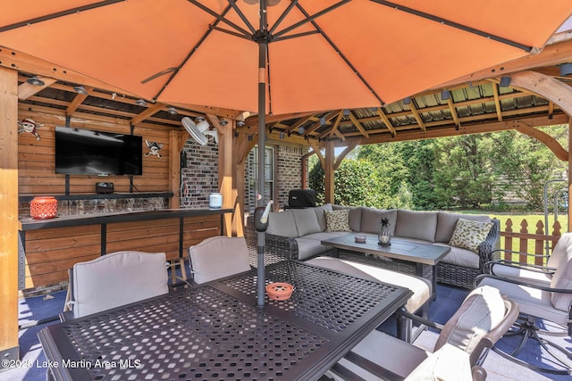 207 Mcdonald St, Dadeville, AL 36853 - view of patio featuring a gazebo, an outdoor living space, and outdoor dining area