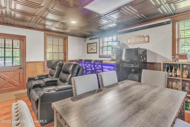 207 Mcdonald St, Dadeville, AL 36853 - cinema with wainscoting, an ornate ceiling, wood finished floors, and wooden walls