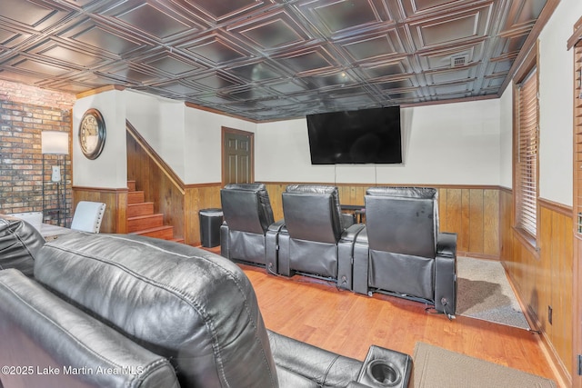 207 Mcdonald St, Dadeville, AL 36853 - cinema with wainscoting, an ornate ceiling, wood finished floors, and wood walls