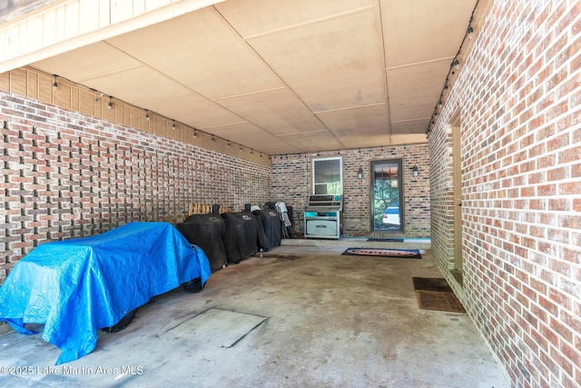 207 Mcdonald St, Dadeville, AL 36853 - doorway to property with brick siding and cooling unit