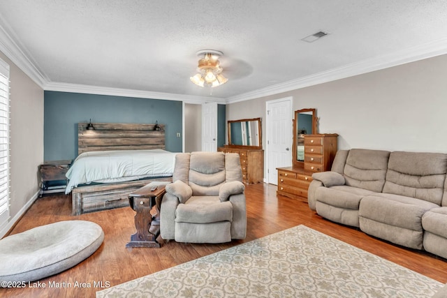 207 Mcdonald St, Dadeville, AL 36853 - bedroom with ornamental molding, wood finished floors, and ceiling fan
