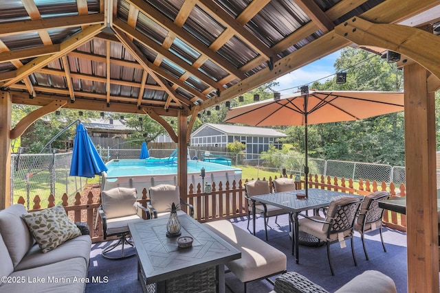 207 Mcdonald St, Dadeville, AL 36853 - fenced backyard with outdoor dining space and a patio