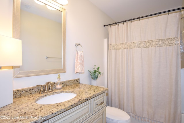 1520 Club Creek Dr, Auburn, AL 36830 - bathroom featuring toilet, vanity, and curtained shower