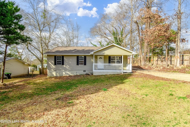 view of front facade with a front lawn and a porch