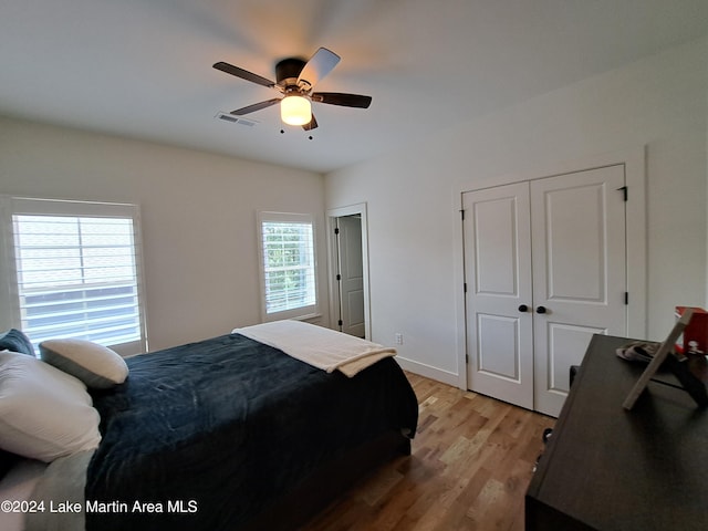 108 Williamson Trce, Tallassee, AL 36078 - bedroom with multiple windows, ceiling fan, and light wood-type flooring