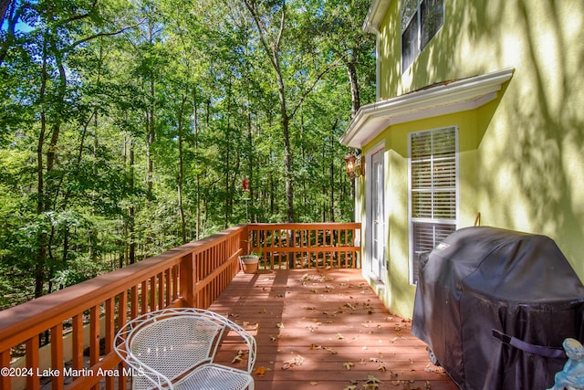 wooden deck with grilling area