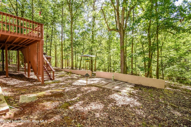 view of yard featuring a deck