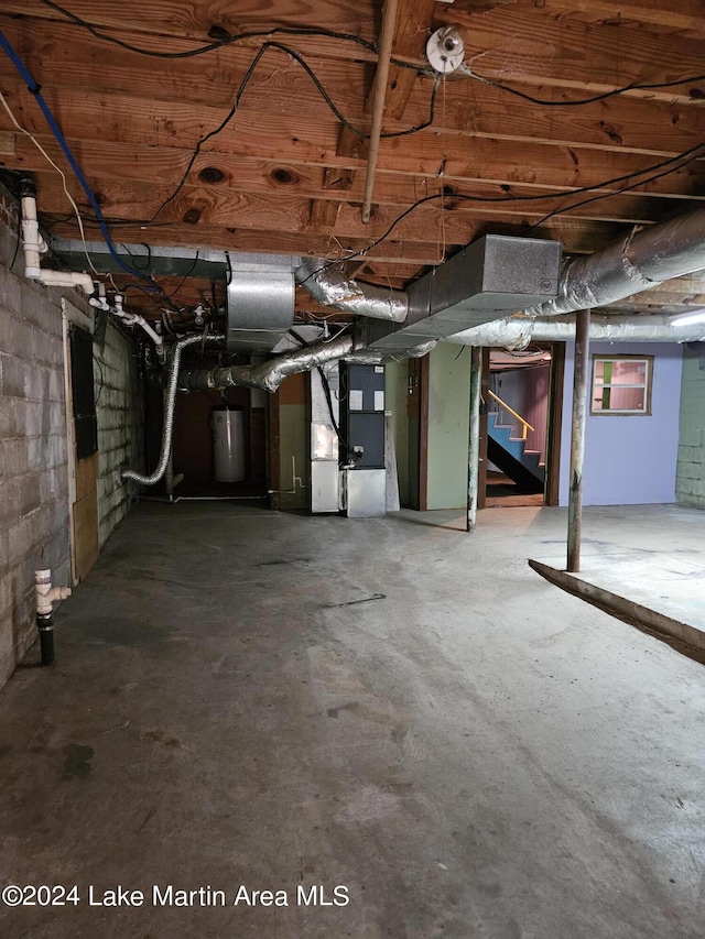 basement with heating unit and gas water heater