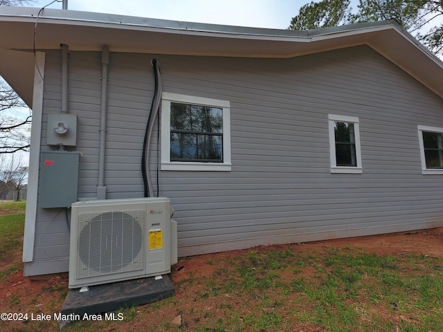 view of home's exterior featuring ac unit