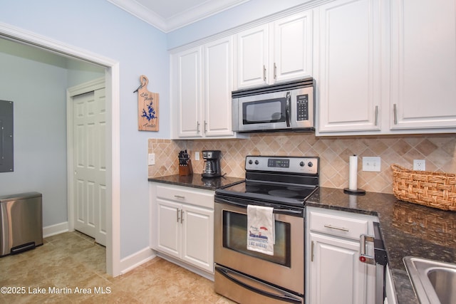 kitchen featuring white cabinetry, ornamental molding, appliances with stainless steel finishes, electric panel, and tasteful backsplash