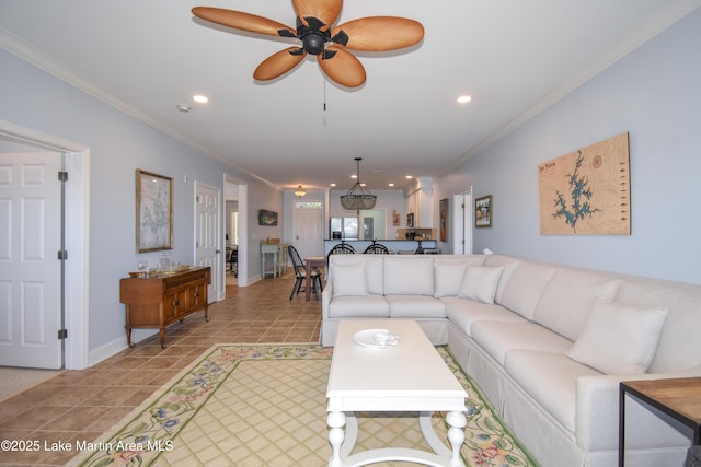 living area with recessed lighting, ornamental molding, and light tile patterned flooring