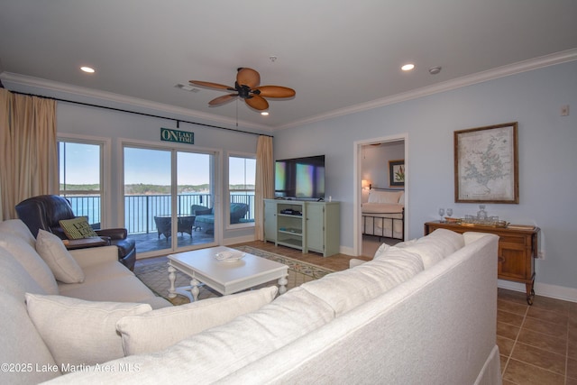 tiled living area featuring recessed lighting, visible vents, baseboards, and ornamental molding