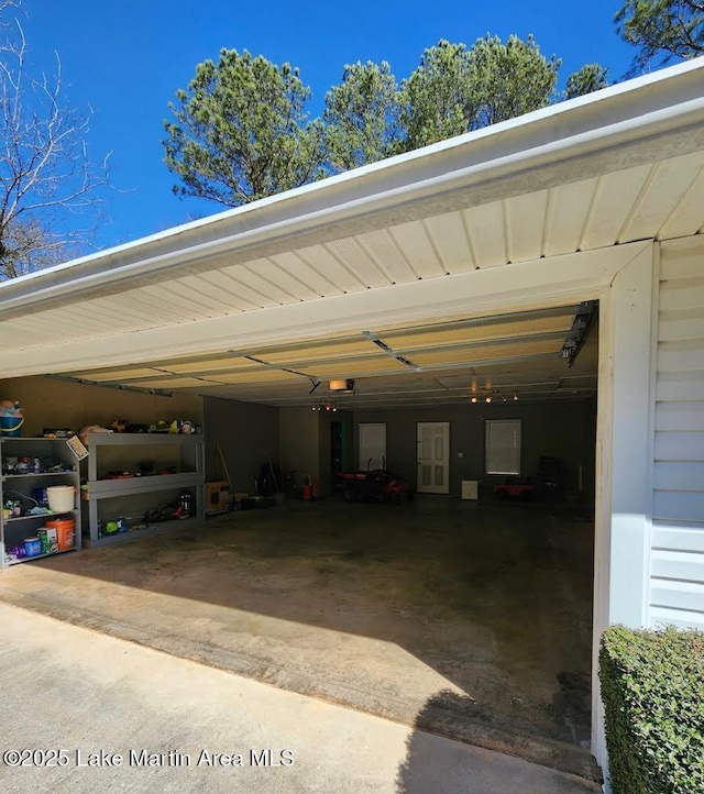 garage featuring a garage door opener