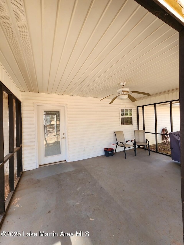 unfurnished sunroom featuring a wealth of natural light