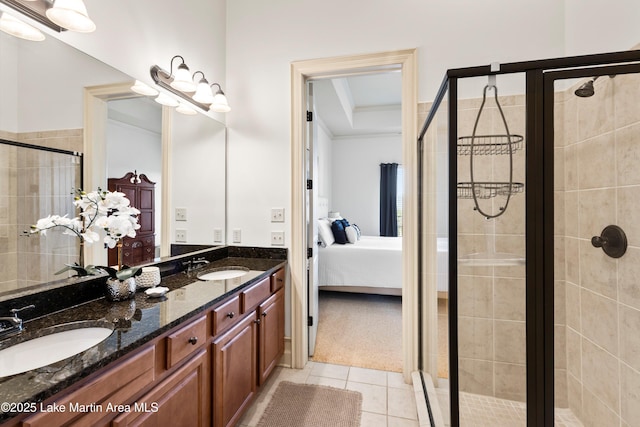 bathroom with vanity, crown molding, tile patterned floors, and walk in shower