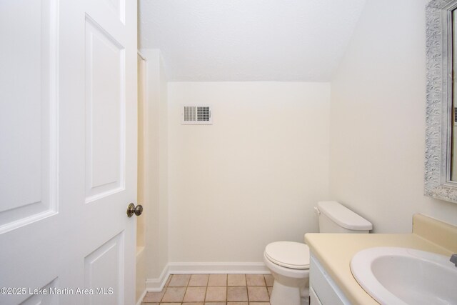 485 Ridgeview Dr, Alexander City, AL 35010 - bathroom with vanity, tile patterned floors, and vaulted ceiling