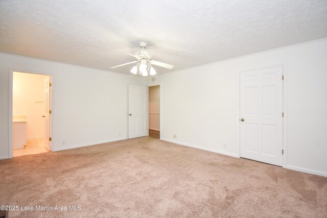 485 Ridgeview Dr, Alexander City, AL 35010 - unfurnished bedroom featuring carpet floors, a textured ceiling, and ensuite bathroom