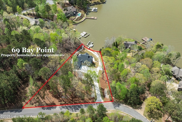 drone / aerial view featuring a water view
