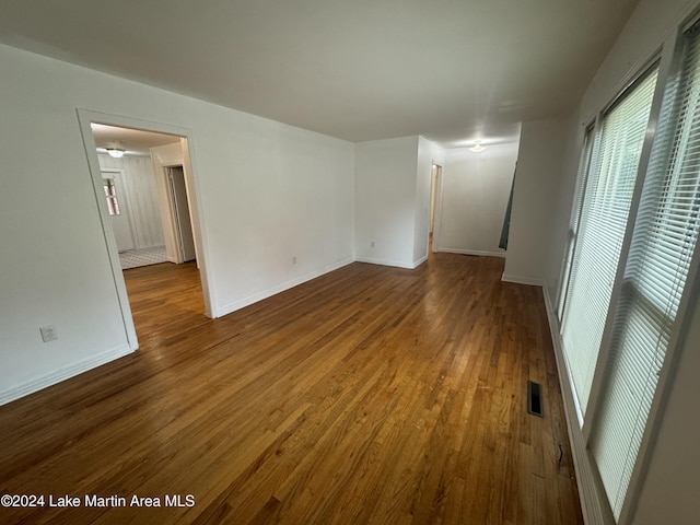 empty room featuring hardwood / wood-style flooring