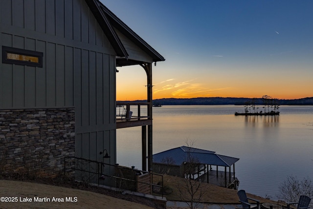 dock area with a water view