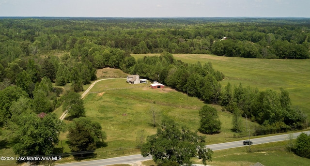 birds eye view of property with a rural view