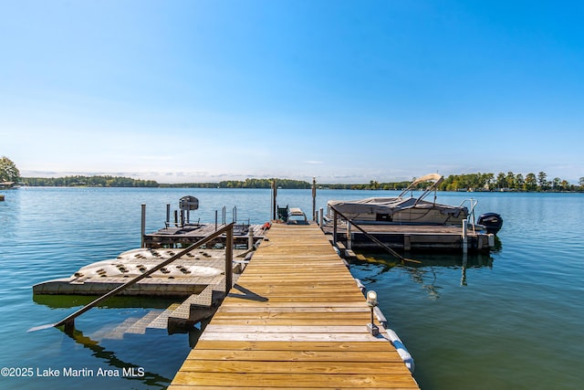 dock area featuring a water view