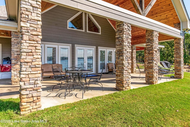 view of patio featuring french doors