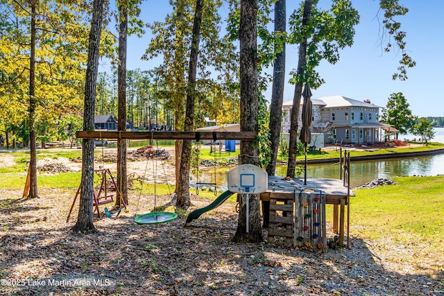 view of play area with a water view