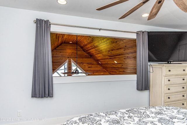 bedroom featuring ceiling fan and vaulted ceiling