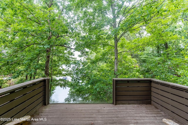 deck featuring a water view