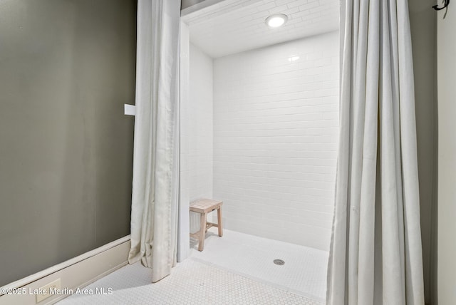 bathroom with curtained shower