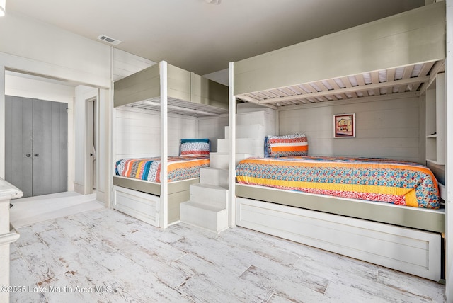 bedroom with wood-type flooring