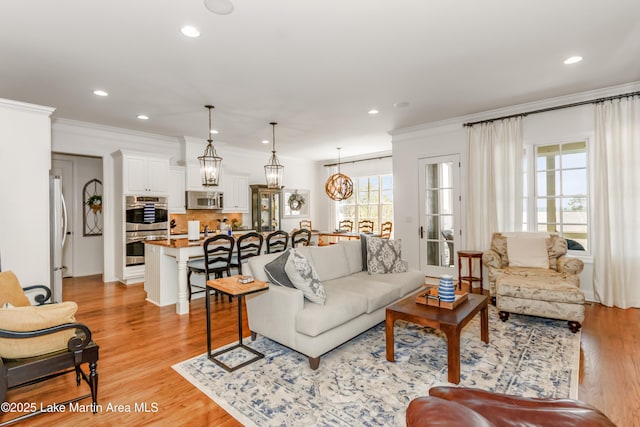 180 Glynmere Dr, Alexander City, AL 35010 - living area featuring recessed lighting, crown molding, and light wood-type flooring
