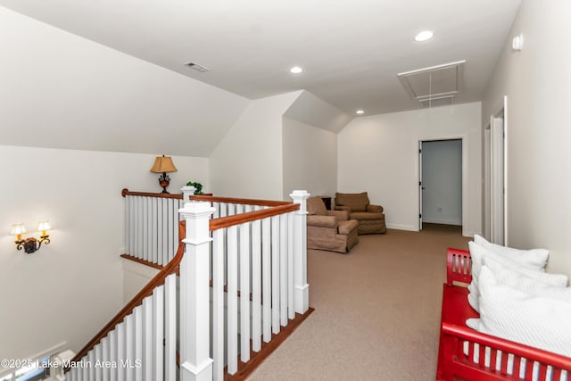 180 Glynmere Dr, Alexander City, AL 35010 - hall with an upstairs landing, carpet, attic access, and vaulted ceiling