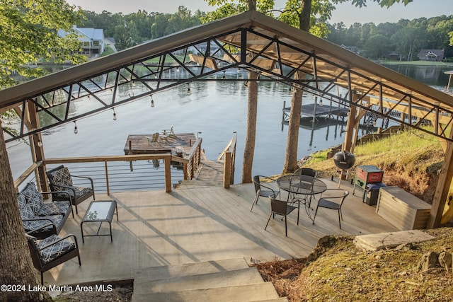 dock area with a water view