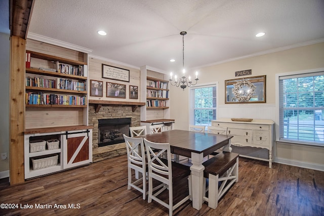 dining area with a fireplace, a healthy amount of sunlight, a textured ceiling, and dark wood-type flooring