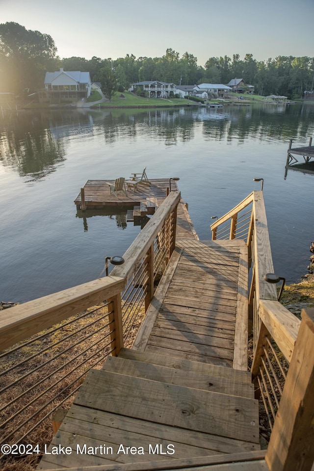 dock area featuring a water view